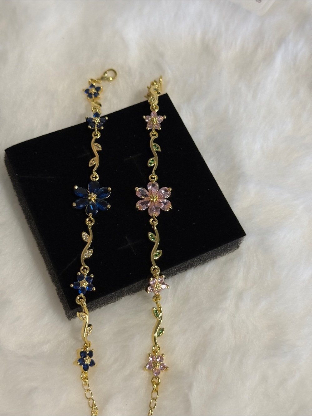 Gold-Tone Pink Flower Bracelet with Green Accents